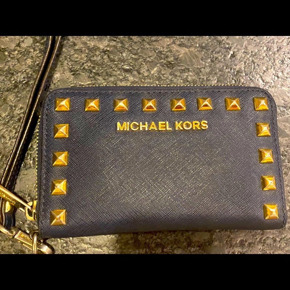 Michael Kors wallet - navy with gold soft spike trimming! Includes clutch strap